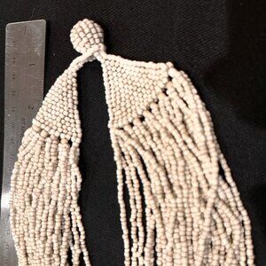 Multi-strand beaded off-white necklace